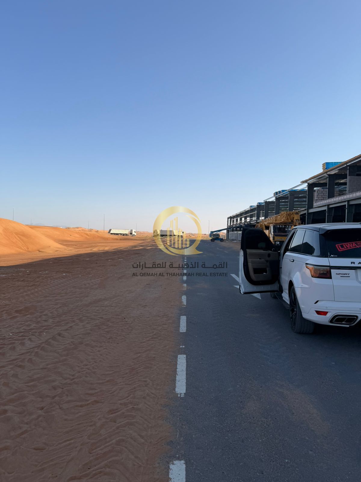 For sale: industrial land in Al-Qasmiya City, Phase Two. Excellent location, corner plot on two streets, in front of the mosque and the park. Freehold