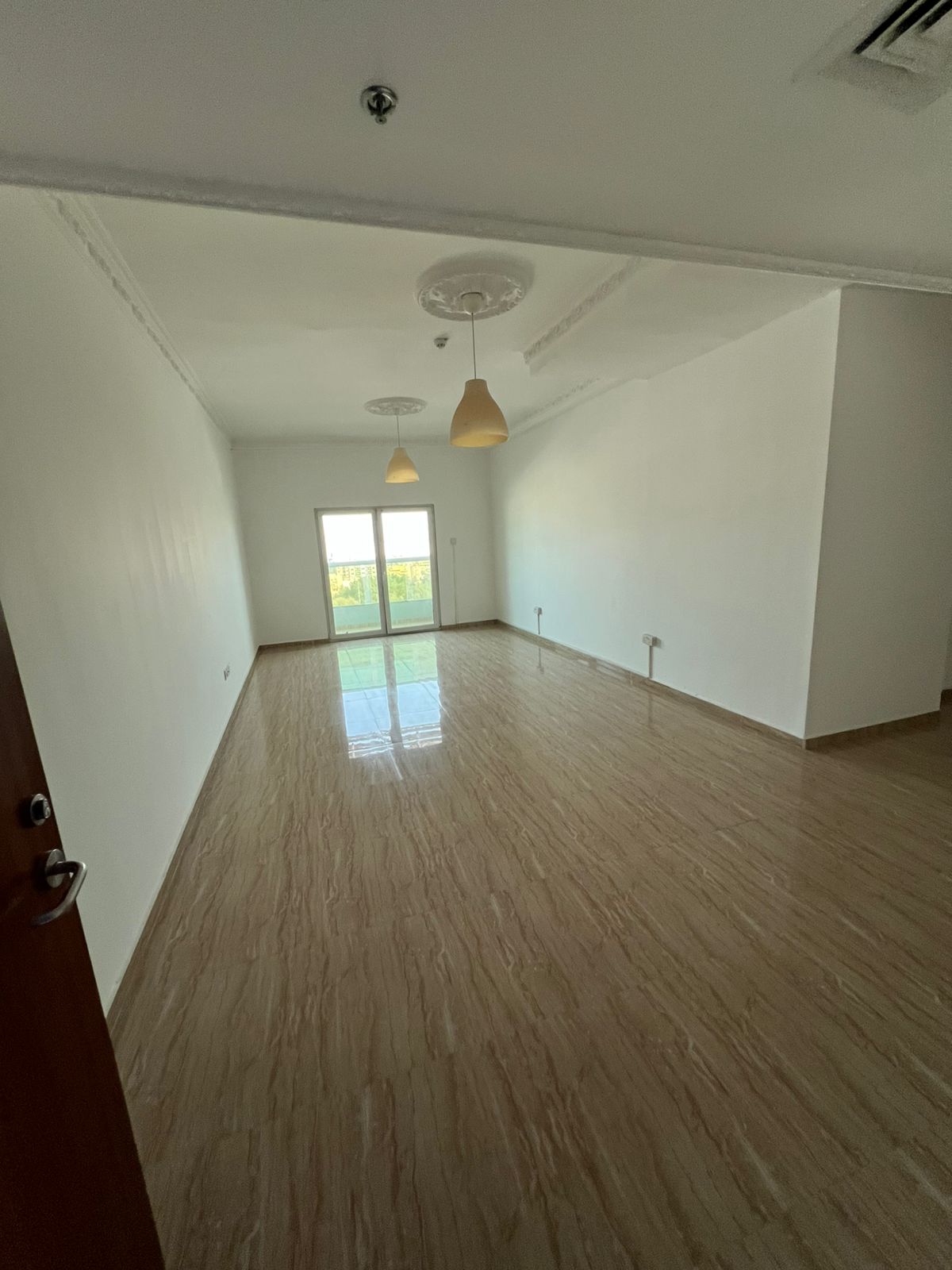Two-bedroom apartment with a large living room in Al Nuaimiya 3, opposite Carrefour.