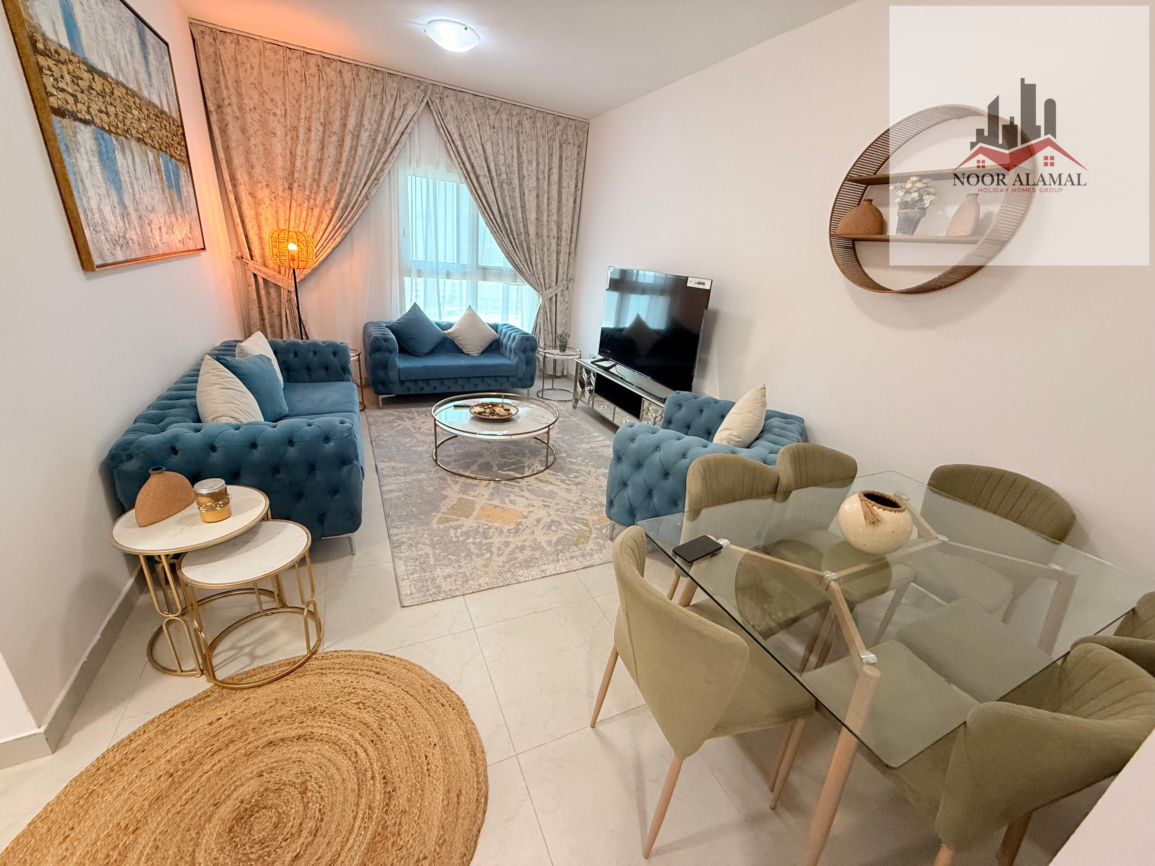 Sharjah Al Taawun, two-bedroom apartment with living room, kitchen, and two bathrooms
