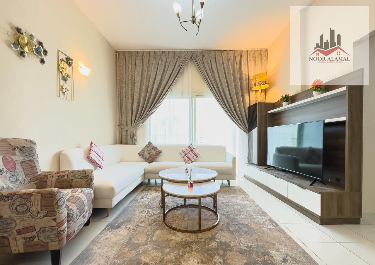 Sharjah, Al Qasimia, two-bedroom apartment with living room, kitchen, and two bathrooms