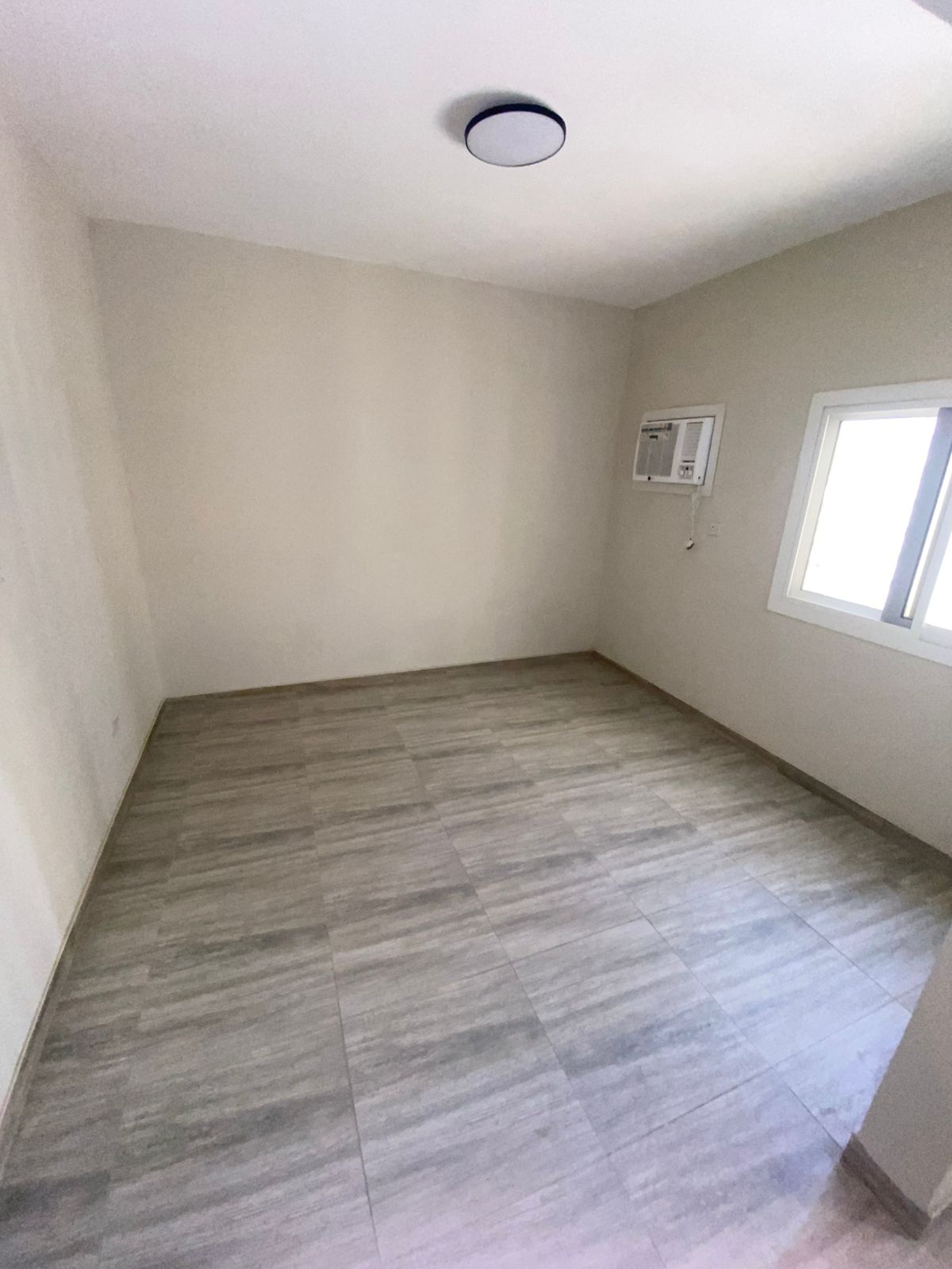 The most beautiful two-bedroom apartment with a spacious living room, modern design, high-end finishing, and a prime location close to all services.