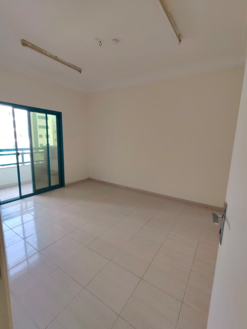 Two bedroom and a living room with a balcony , family occupancy