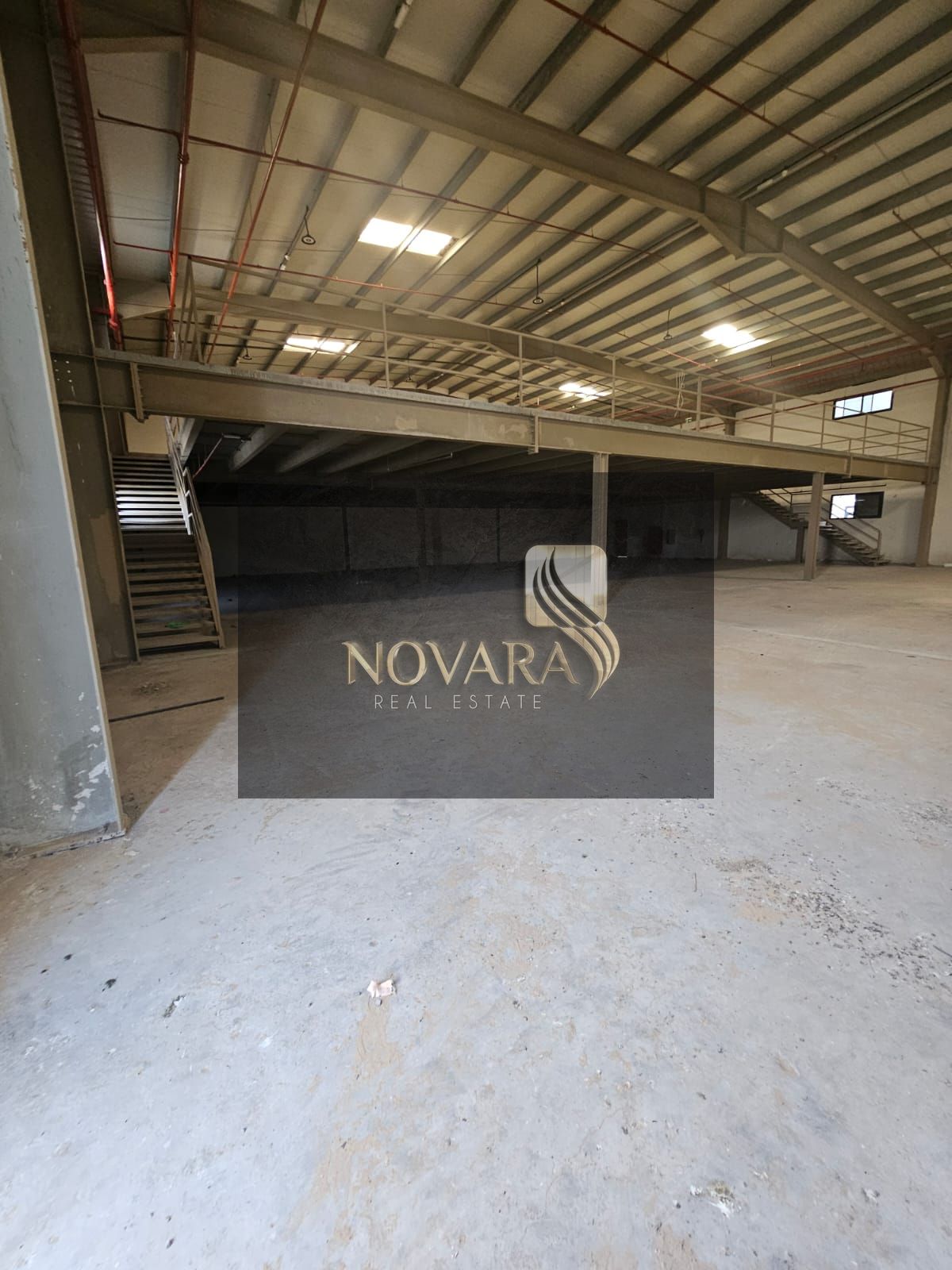 Warehouse for rent in Umm Al Quwain, Umm Al Thu’oub, 13,000 sq ft (8,000 ground + 5,000 mezzanine), 80 kW, AED 390,000/year
