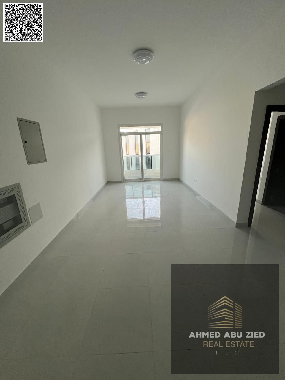 For annual rent in Ajman, a brand new building, first occupancy available. One-bedroom apartment with a living room, two bathrooms, a balcony with an