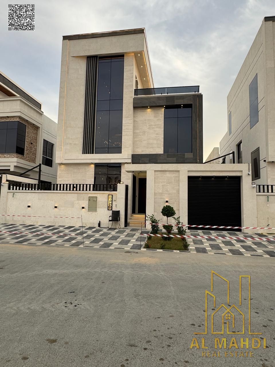 Direct from the owner, including all ownership fees: a villa in one of Ajman's most luxurious villas, built and finished to a super deluxe standard, w
