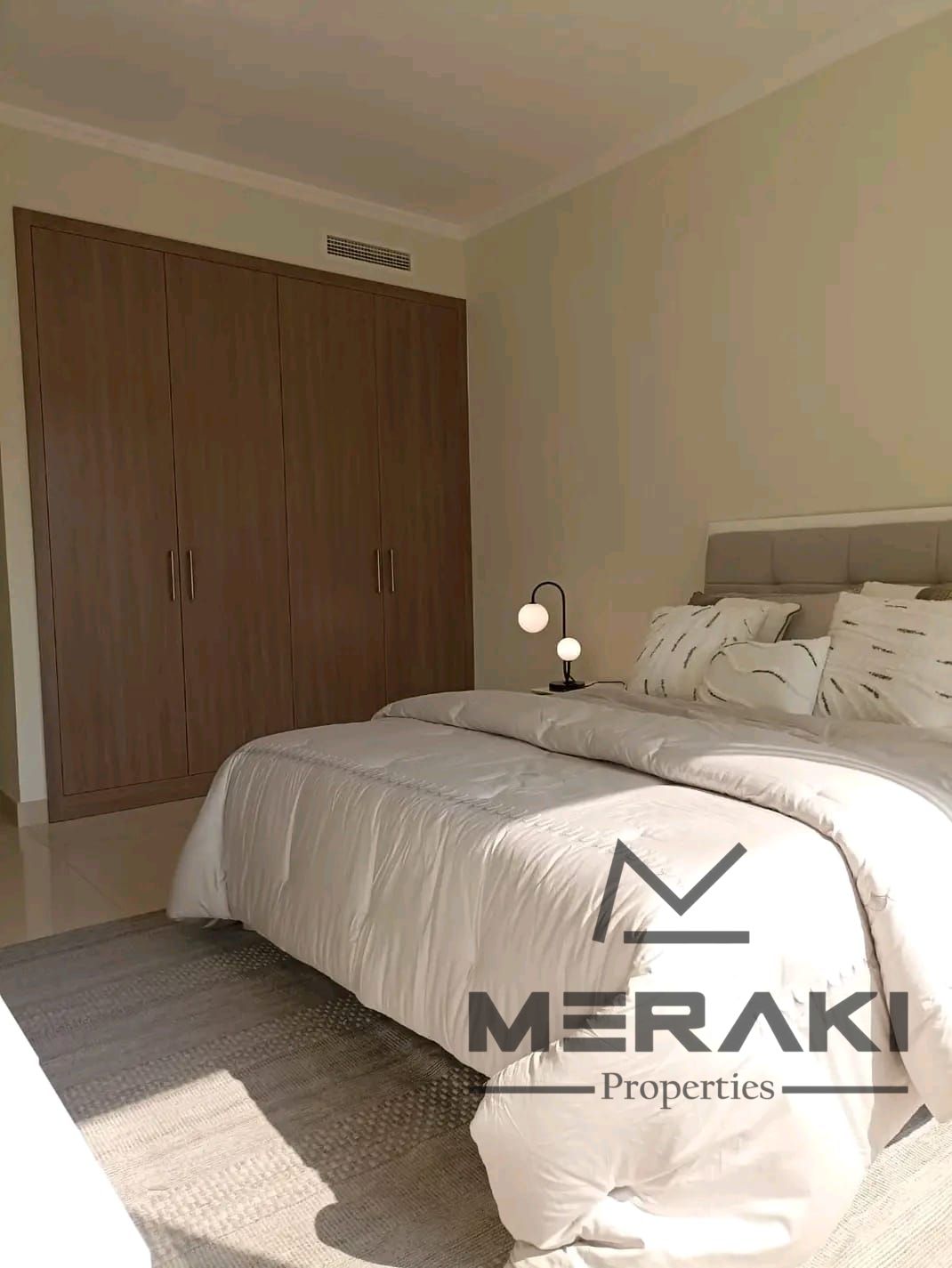For Sale – Two-bedroom apartment with a living room in Ajman One Towers (Phase 2) with free air conditioning
