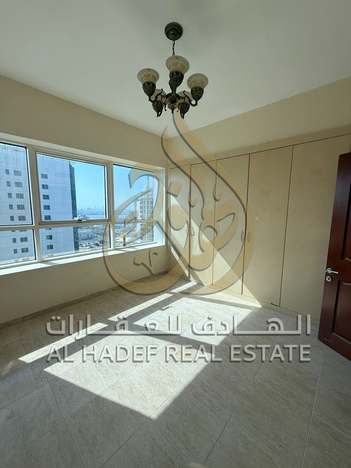 3-bedroom apartment with a living room, gym, swimming pool, parking, and free air conditioning – Payment in 4 or 6 checks – Al Taawun
