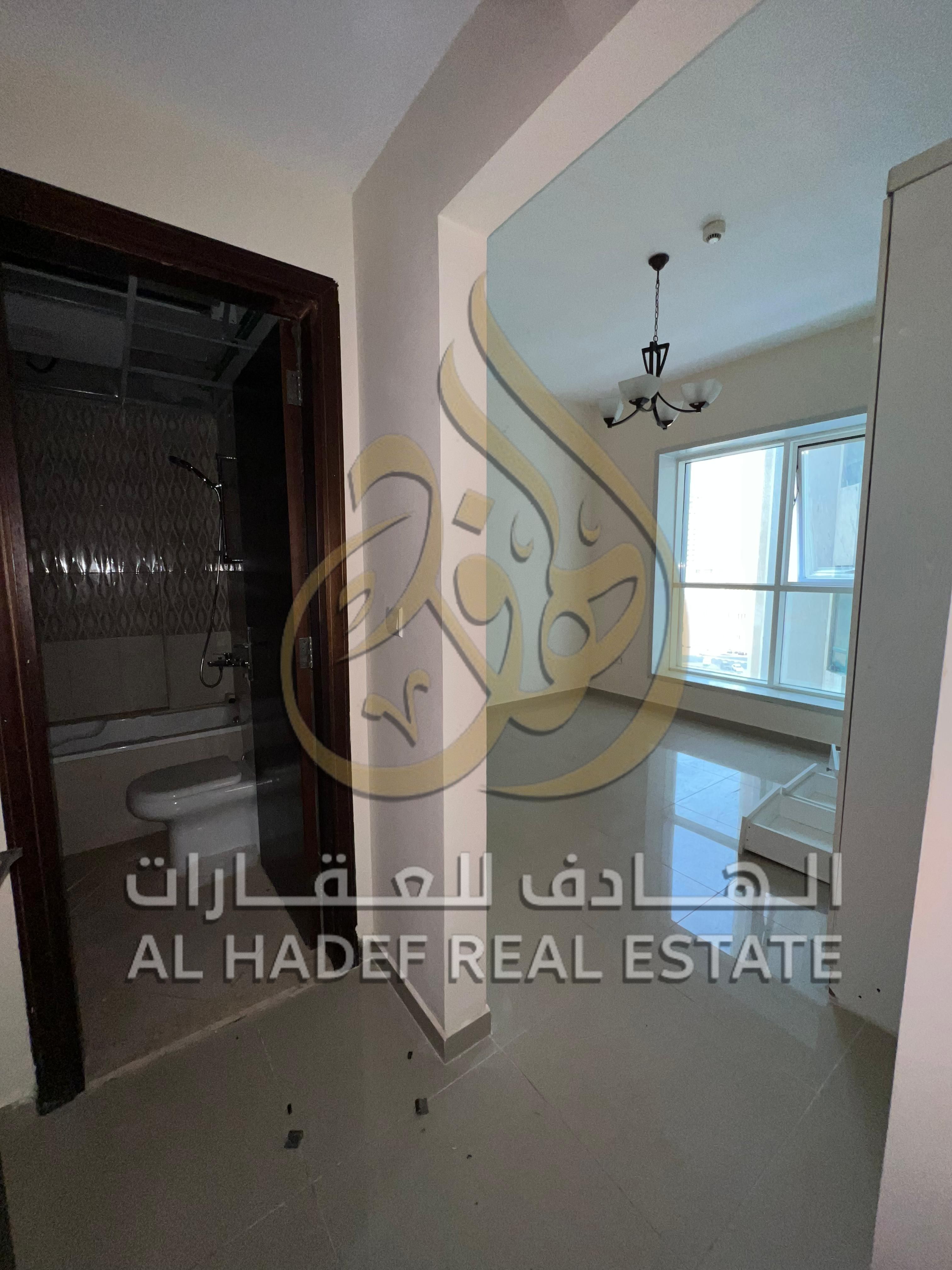 Two-bedroom apartment with a living room, offering a good size, ventilation, and natural light in Al Majaz 2.