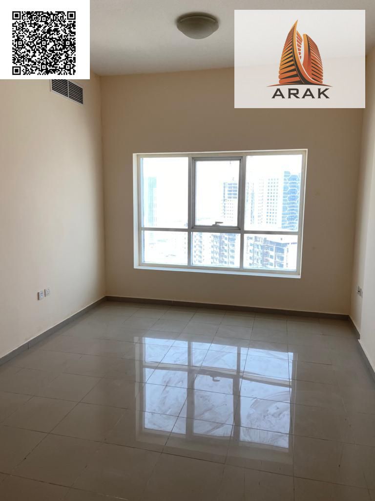 A great opportunity for sale in Ajman Pearl Towers a one bedroom and living room apartment in a prime location with a fully open view overlooking