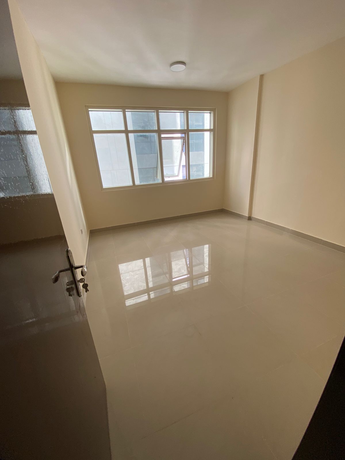 Apartment for rent in Al Majaz 2BR hall 2 bathrooms central AC near services AED 45000 deposit 2500