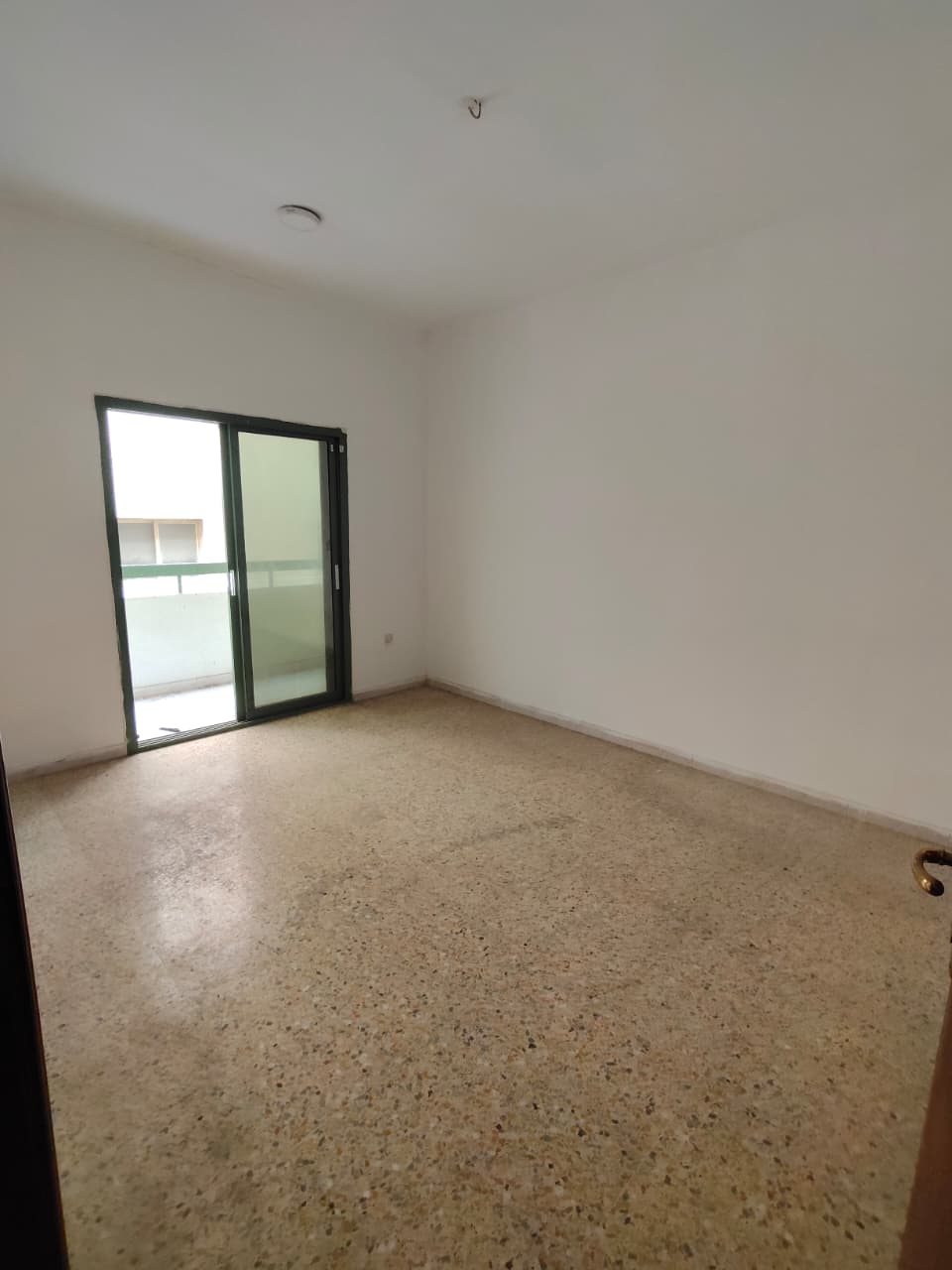 Two-bedroom family apartment in Al Qasimia Al Mahatta, prime location near all services and easy access to Dubai.