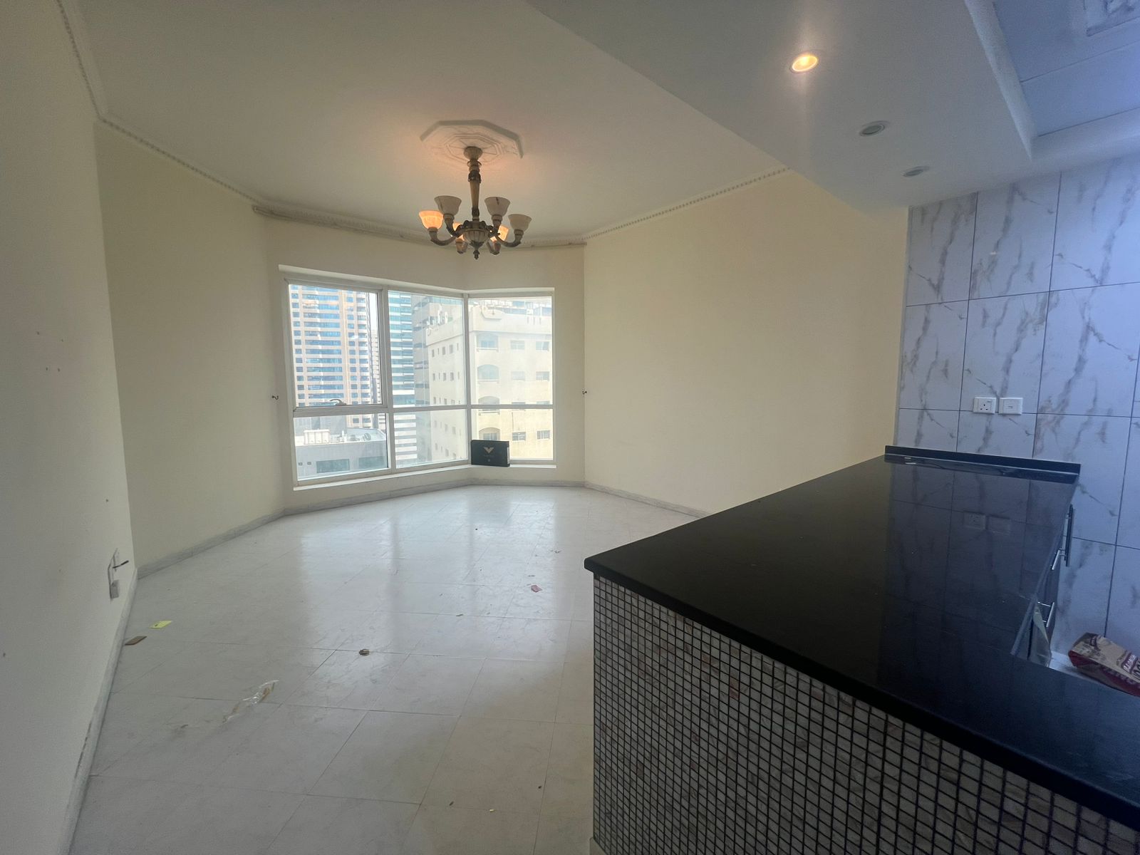 Free AC + open view, American kitchen, laundry room, prime lively location near malls, cafes & schools.