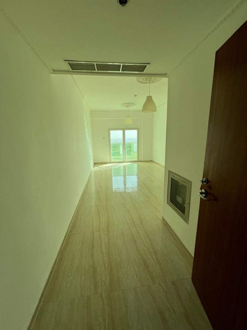 Two rooms and a large living room with parking, Al Naeemia 3, in front of Carrefour, next to City Tower