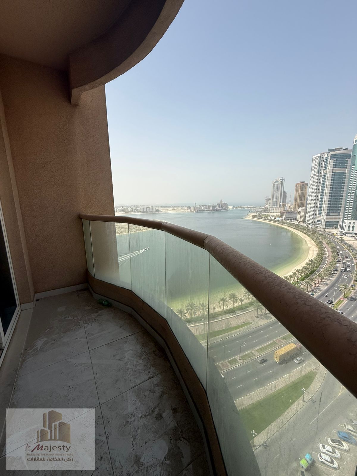 For rent: a two-bedroom apartment with a living room in the Al Khan area, Sharjah.