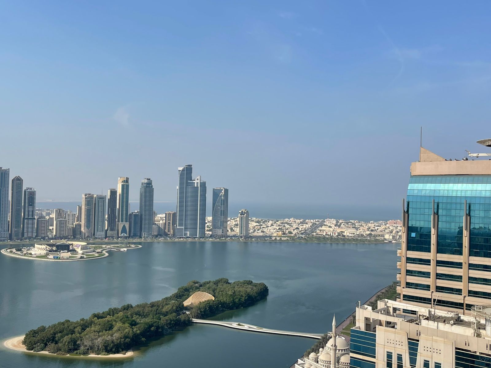 Most beautiful 2-bedroom apartment with hall and balcony, sea view, free parking, free AC, free gym & pool in Al Majaz 1.