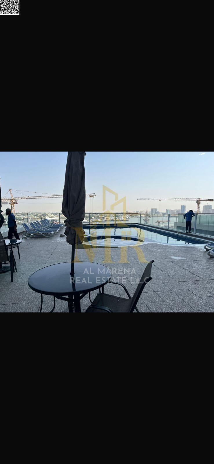 Two-bedroom apartment for sale in Al Waha Towers with a direct view of the creek, comfortable spaces and a modern design, prime location close to serv