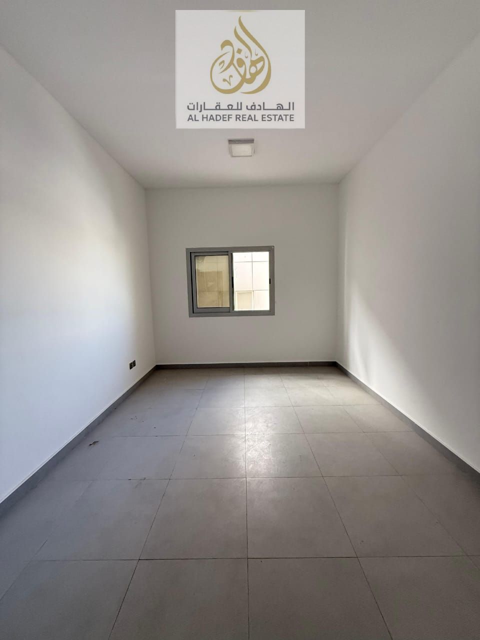 Available for annual rent: Two-bedroom apartment with a living room and 2 bathrooms (no balcony) in Al Rawda 1, located behind Al Hamidiya Police Stat