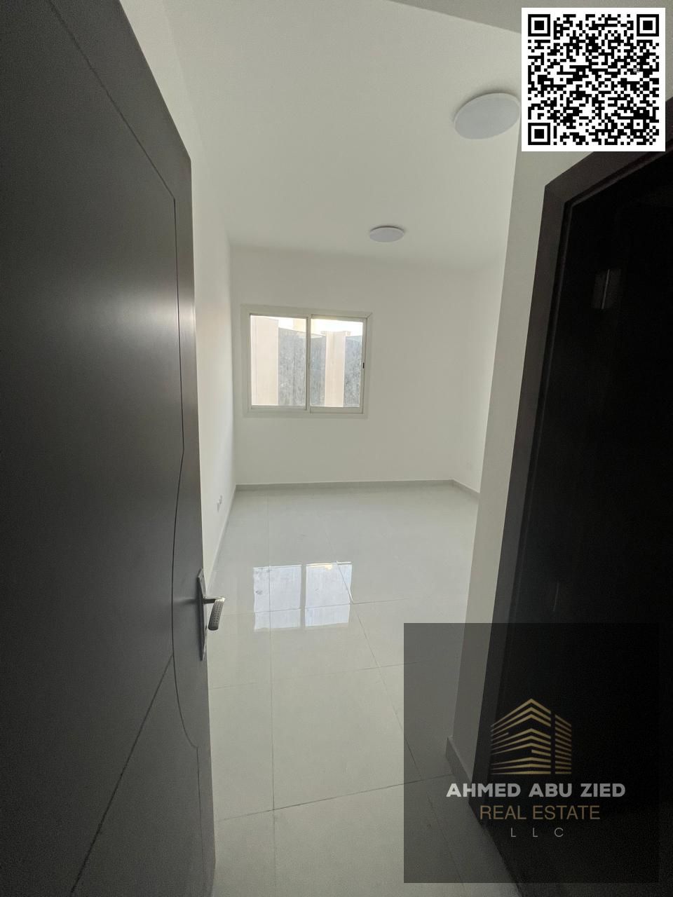 Annual Rent – 1BR + Living Room | 2 Bathrooms | Balcony | First Tenant | Located in Al Jurf 2 | Next to All Schools | Directly on the Main Road