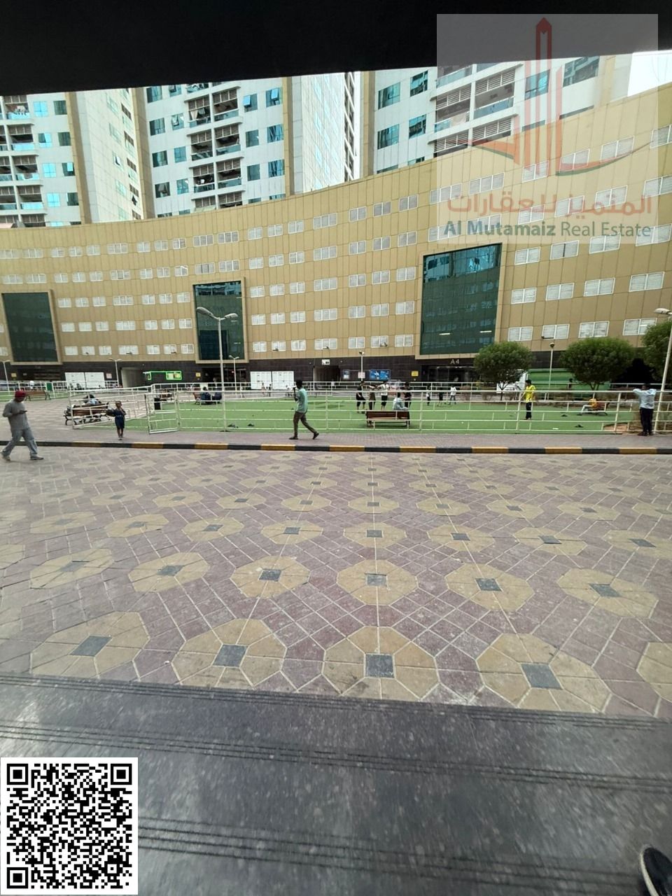 For sale in Ajman: One-bedroom apartment with living room, two bathrooms, and balcony in Pearl Towers. Asking price: AED 350,000