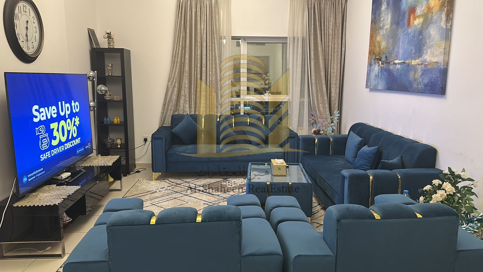 Furnished two-bedroom apartment in Orient Towers, Ajman, with free swimming pool and gym access.