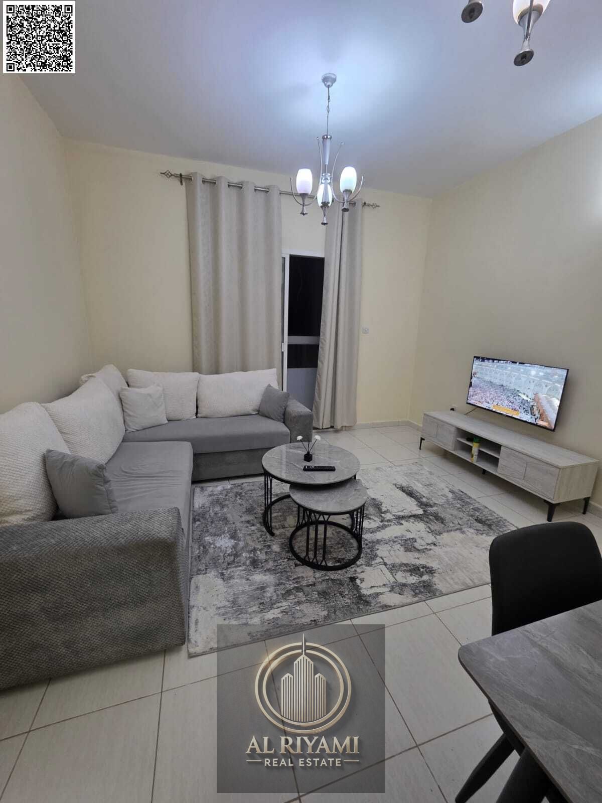 One bedroom and living room, first occupancy, for monthly rent in Al Rashidiya 3, behind Grand Mall