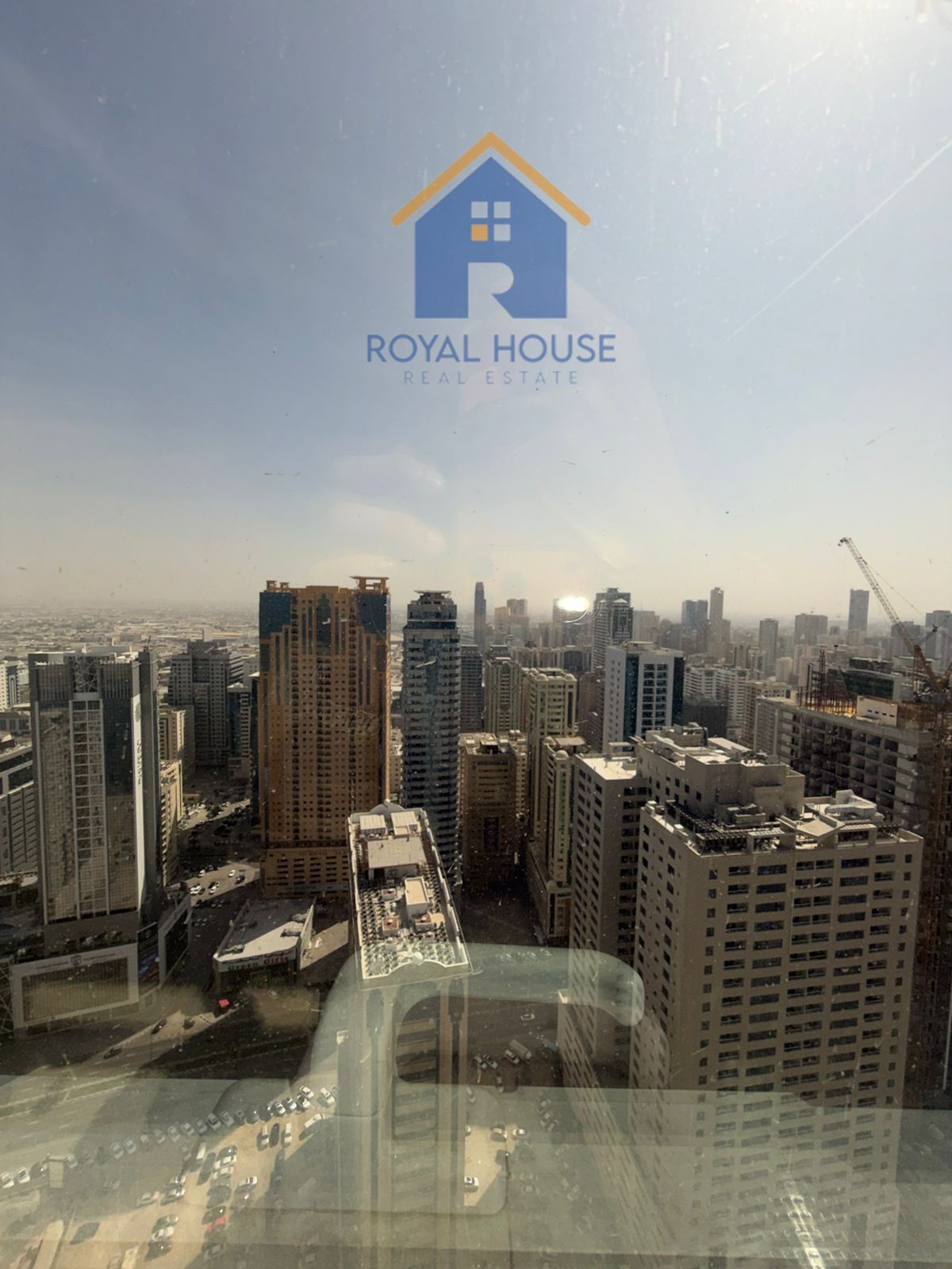 Three rooms for sale in Al Waha Tower with city views at a bargain price