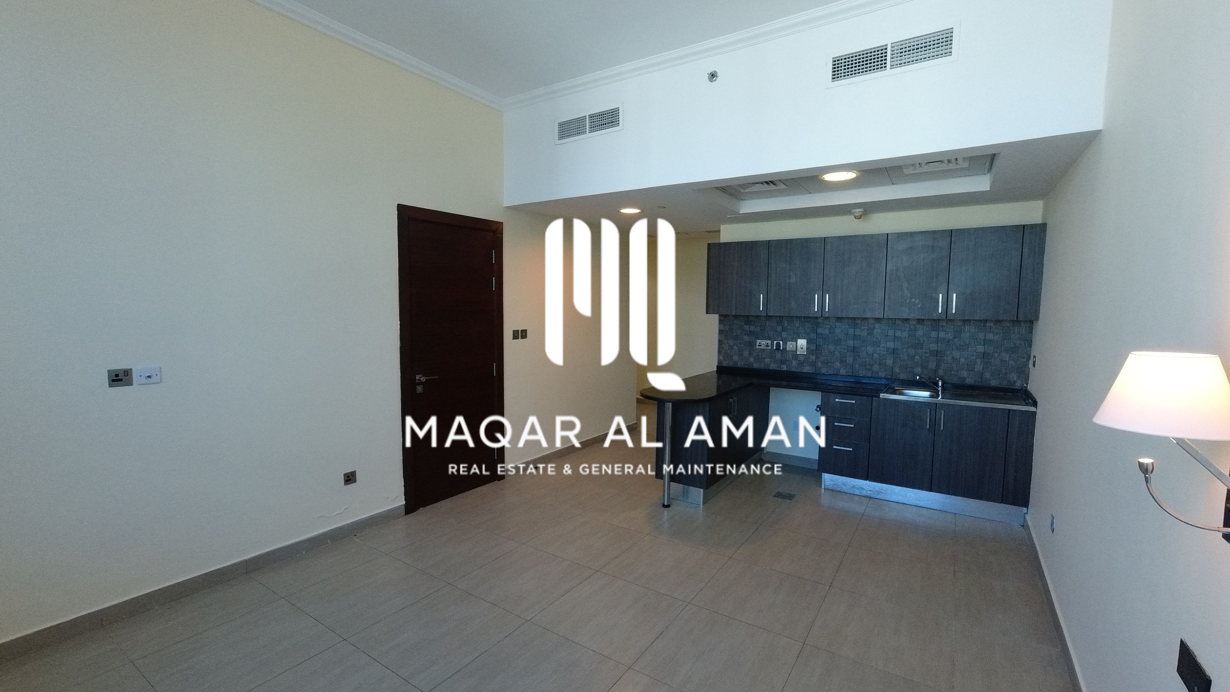 Unfurnished 55 sqm Studio for Rent in Hamdan Street | Utilities & WiFi Included | AED 58,000/Year