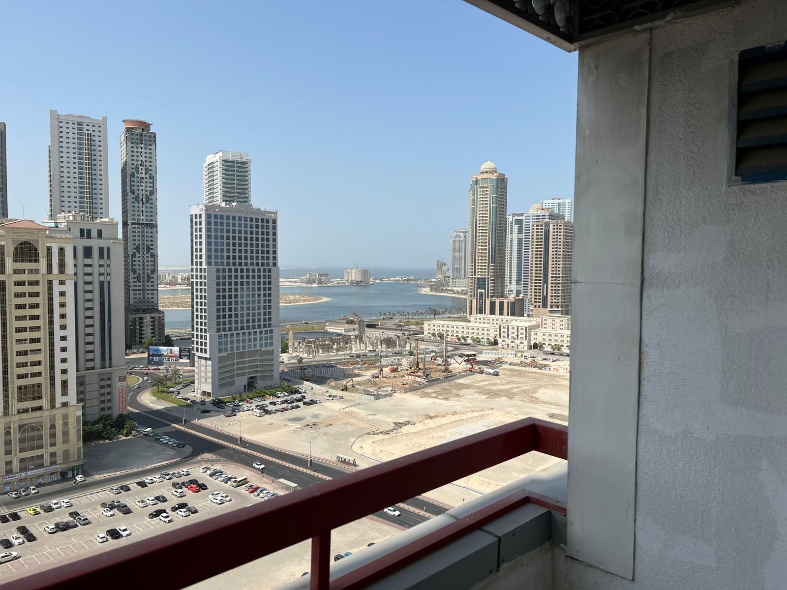 Most beautiful 2-bedroom apartment with a balcony in the living room, open view, free parking, and spacious layout in Al Majaz 2.