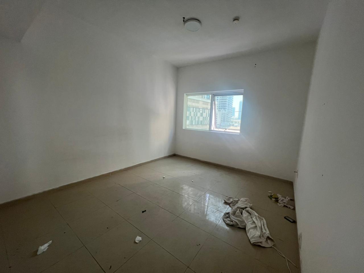1BR in Al Khan 3 with wardrobes, 4 or 6 payments, AED 2,000 security cheque (not cashed). Clean unit, ready to move in.