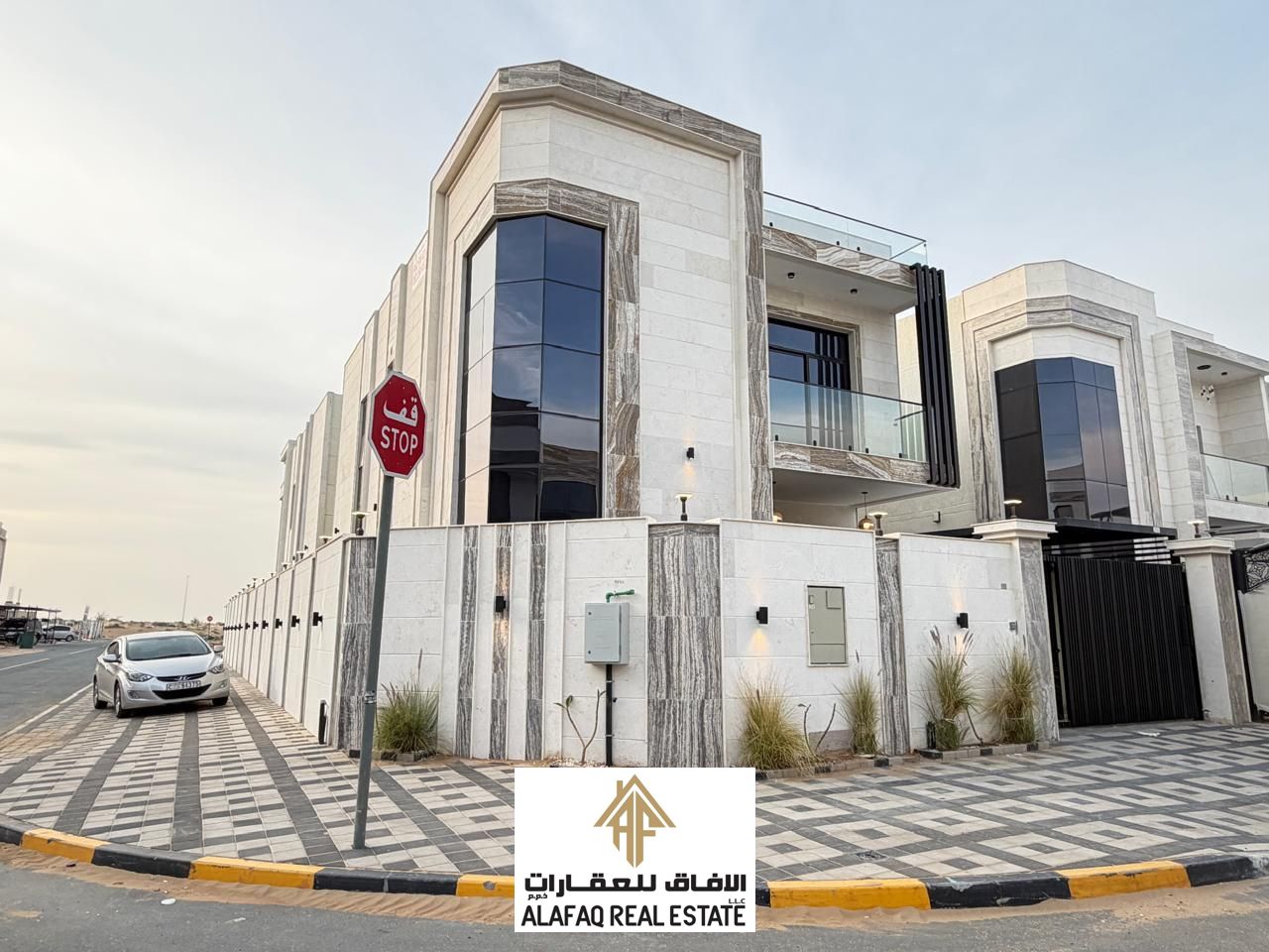 For rent: super deluxe residential investment villa in Al Zahya, Ajman, on a corner asphalt road with two street-facing sides, luxurious marble and st