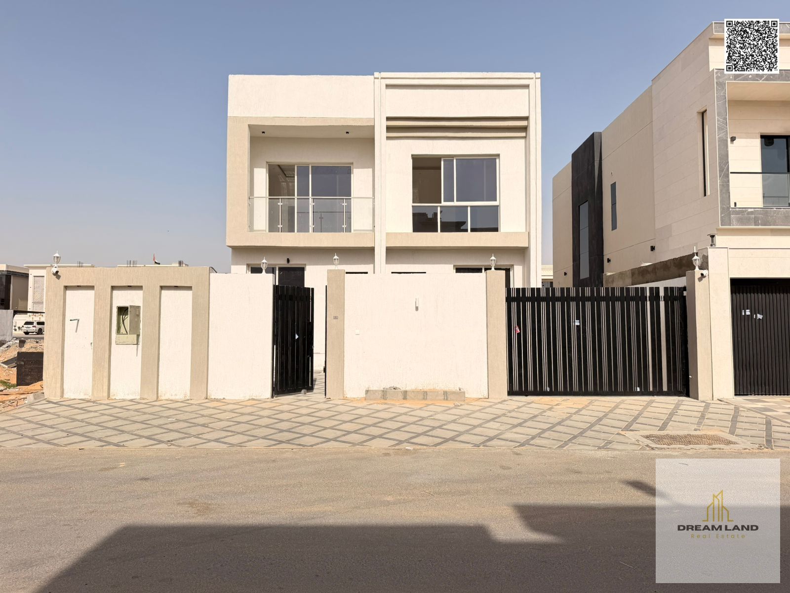 Direct from the owner, including all ownership fees: a villa in one of Ajman's most luxurious villas, built and finished to a super deluxe standard, w