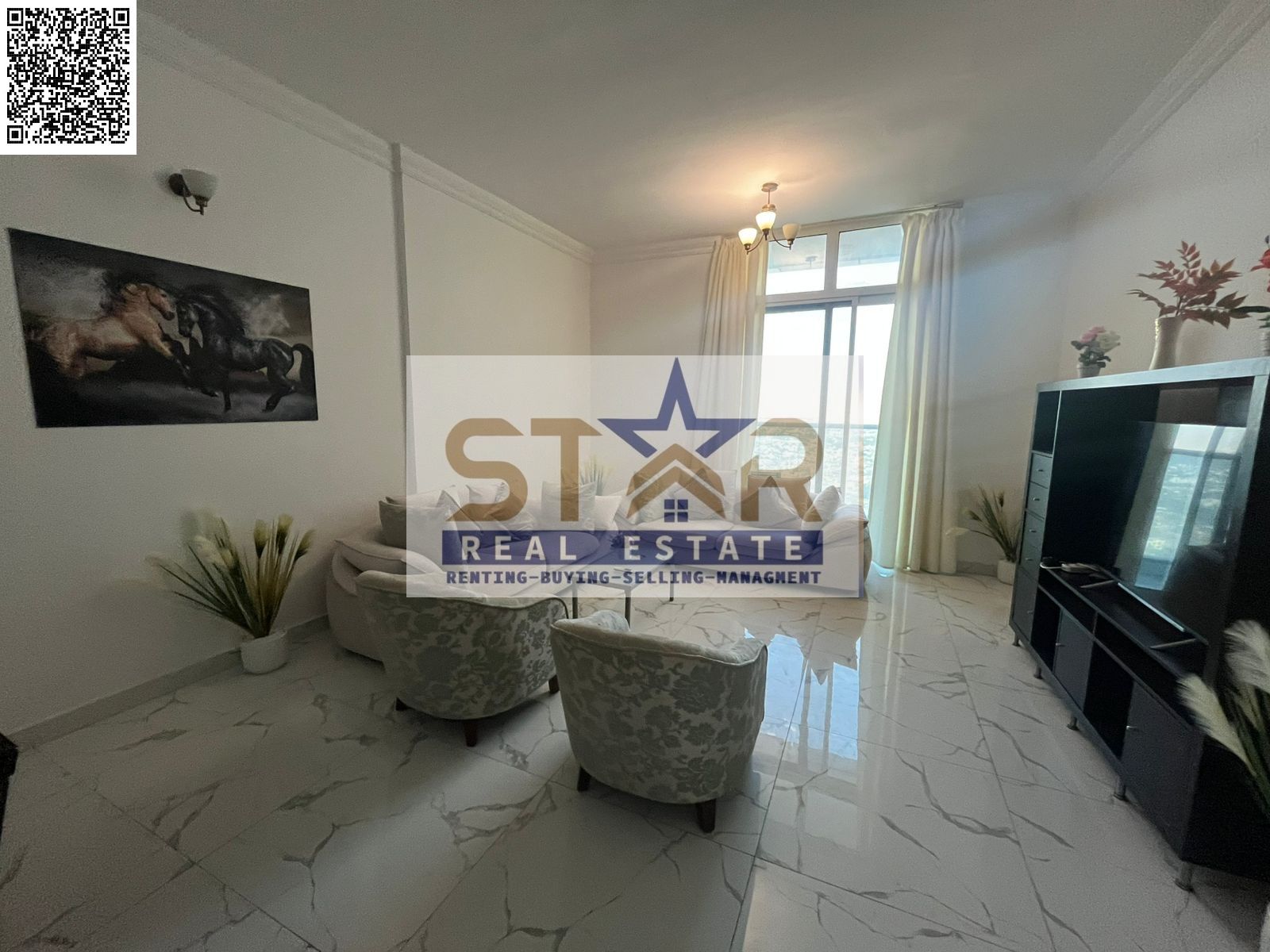 Al Waha Towers on Al Mina Street in Ajman. It boasts a prime location near the Ajman Fish Market