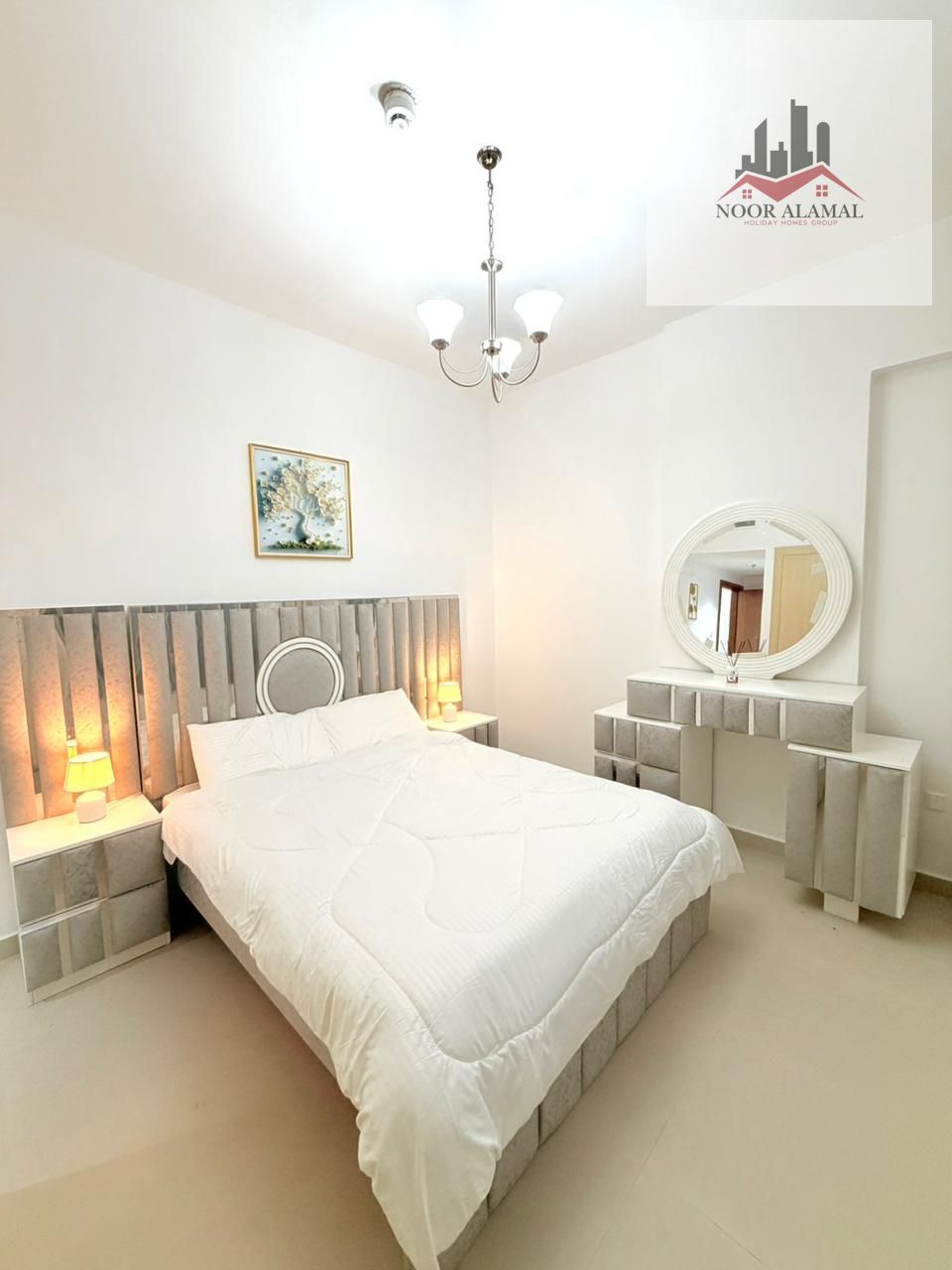 Dubai Liwan 2, first occupancy, brand new furnishings, one bedroom, living room, kitchen, two bathrooms, and balcony. Price: 8500 AED including all bi