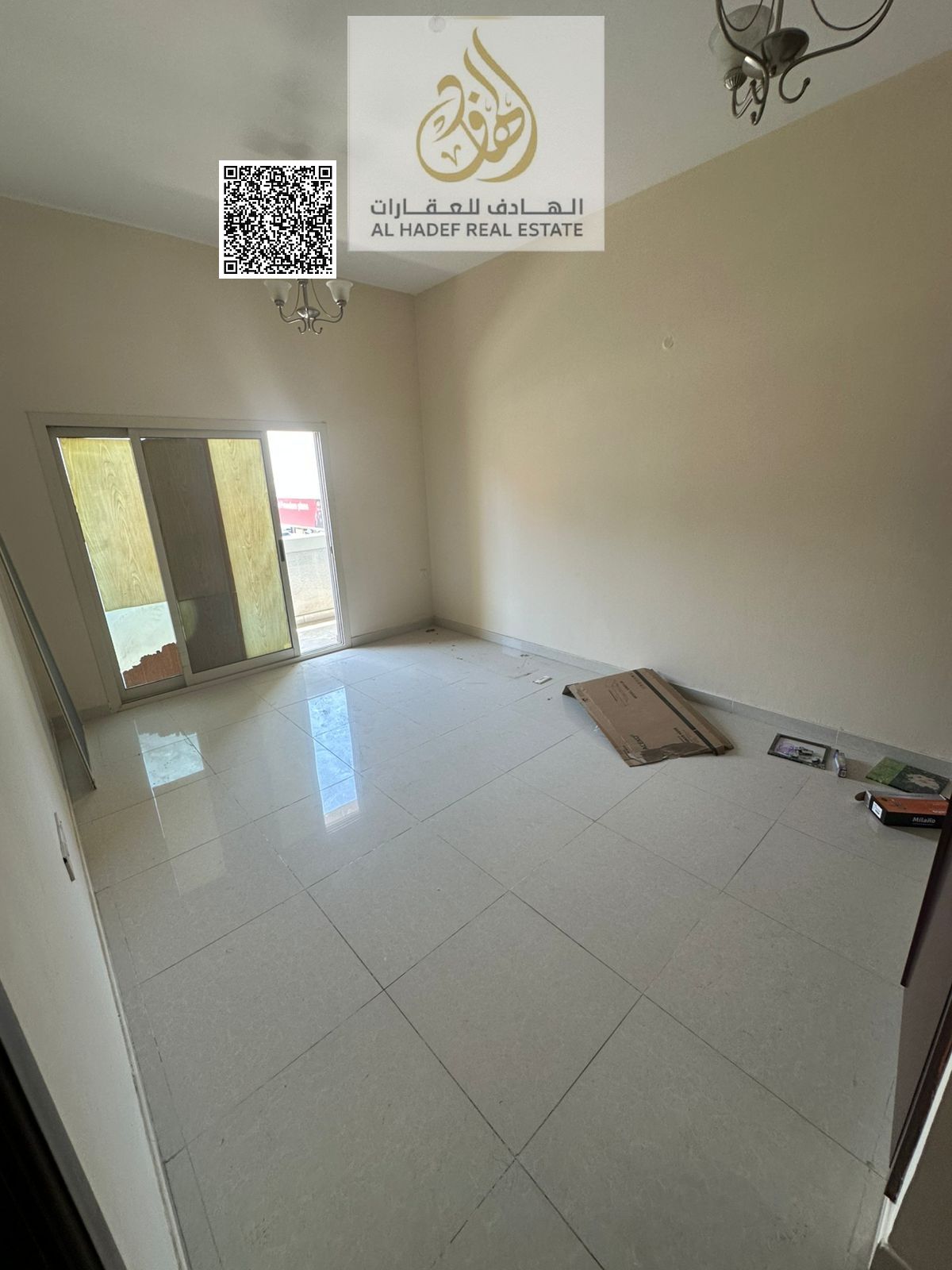 Two-bedroom apartment with a living room for annual rent in Al Nuaimiya 1, on Al Ittihad Street.