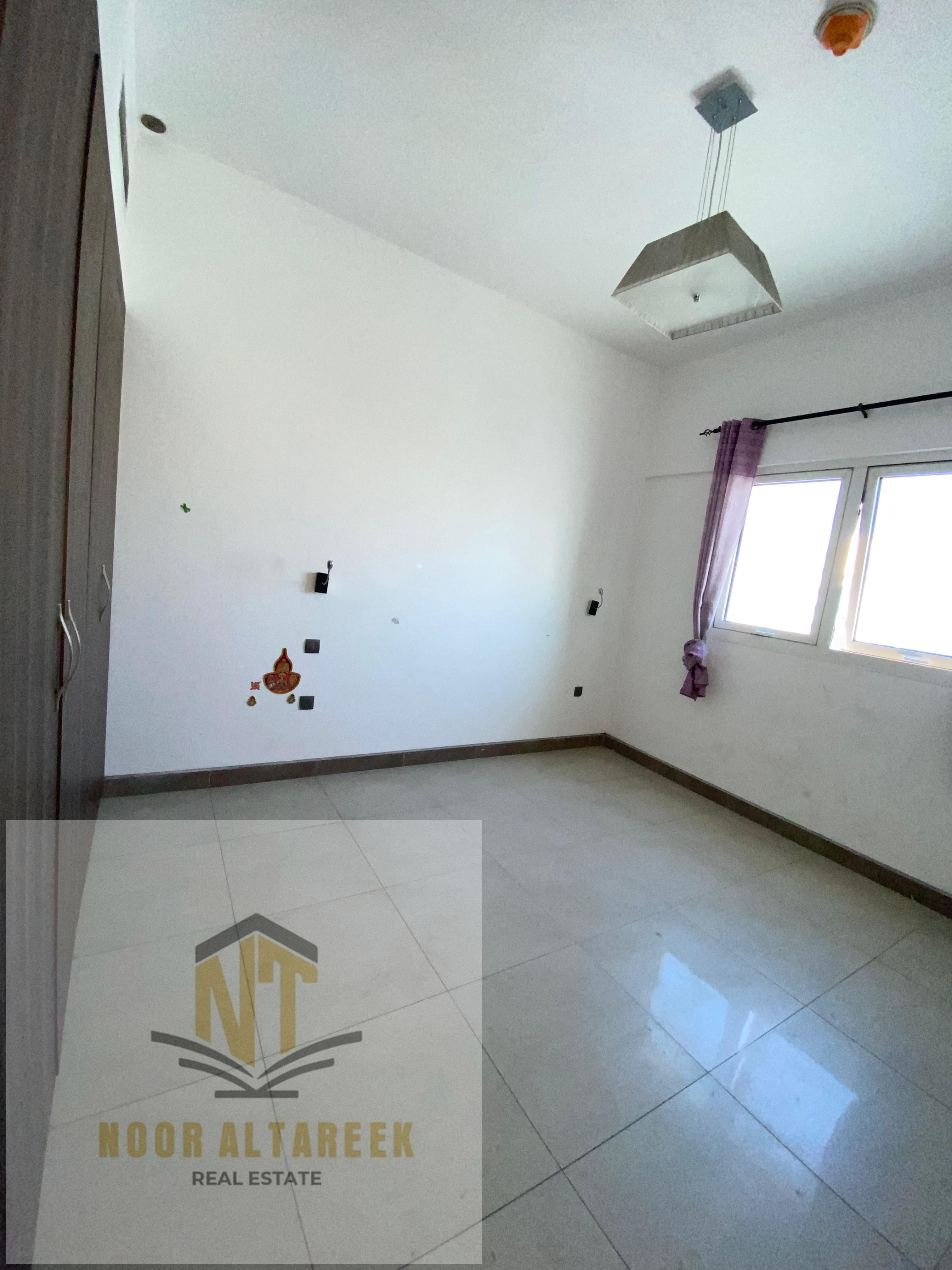 Professional and attractive ad: Apartment for annual rent in Umm Al Tarafa, Sharjah, featuring **2 bedrooms and a spacious living room**, along with