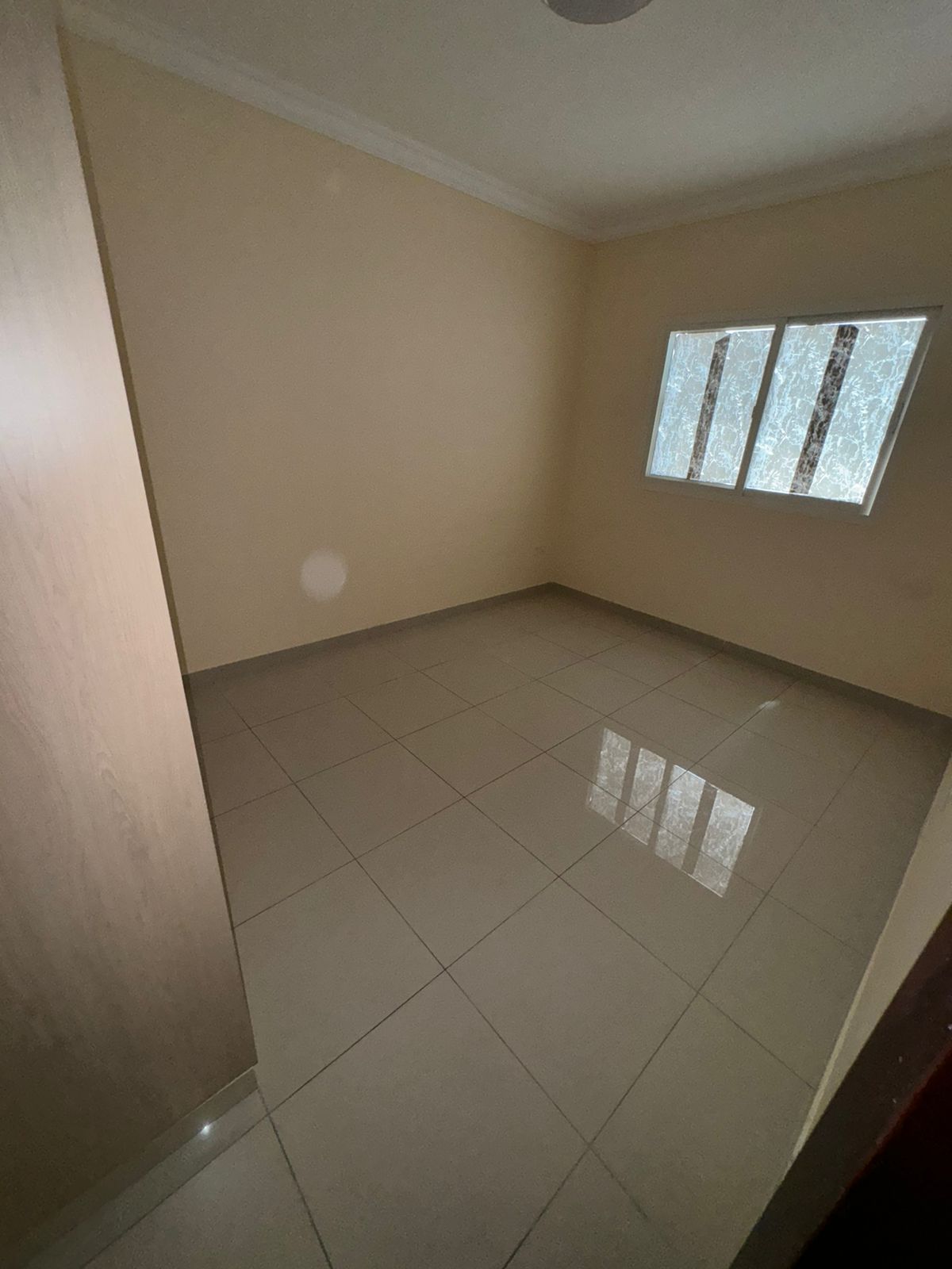 1BR apartment in Al Jurf 3, brand new, 2 baths (master), balcony & built-in wardrobes, modern finish, near China Mall & services.