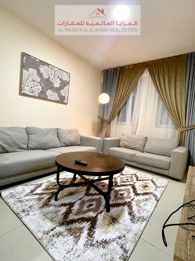 for rent monthly A fully furnished One-bedroom Two-bathroom apartment in Al Majaz3
