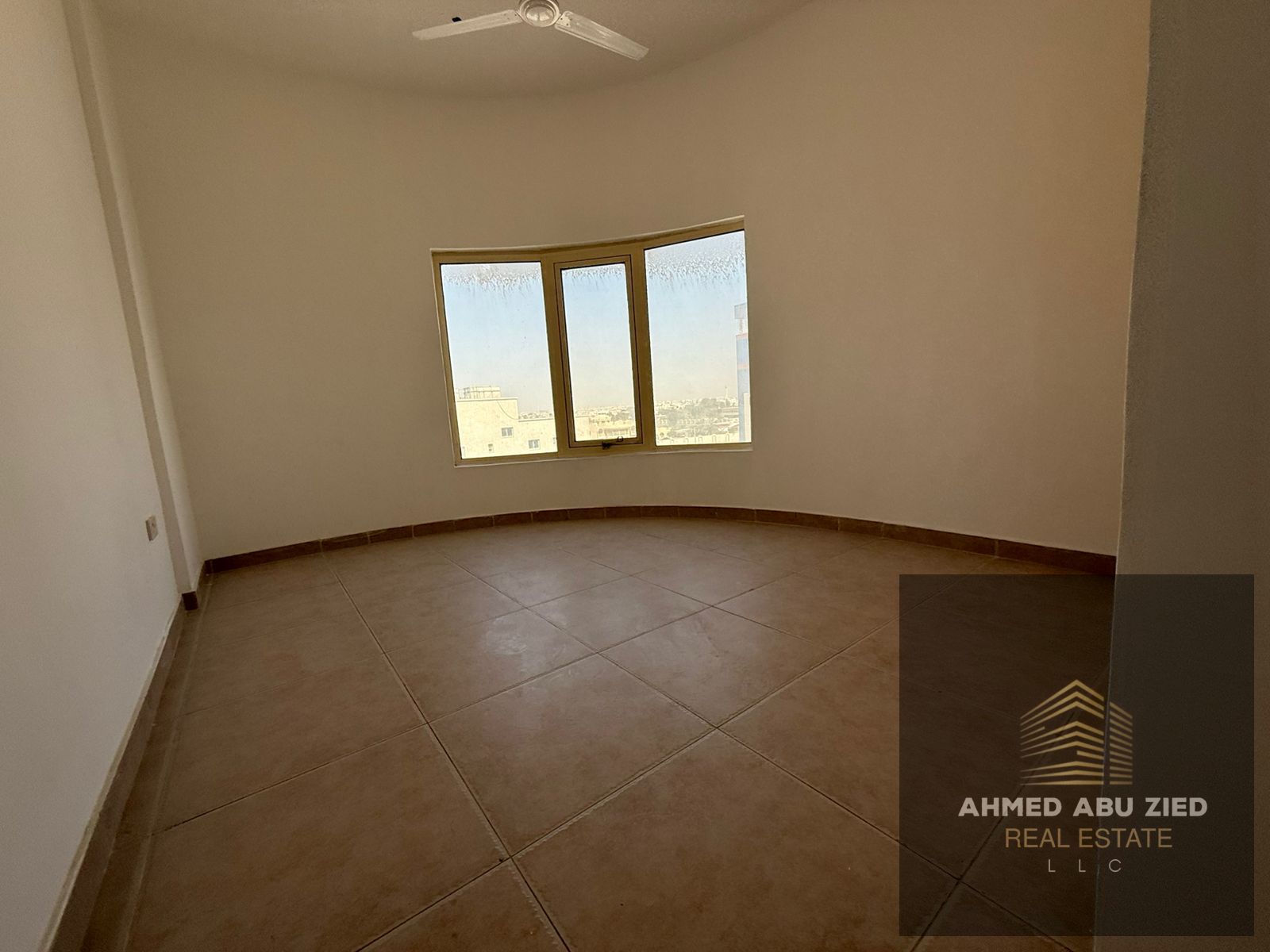 Largest two-bedroom apartment for annual rent in Al Rawda 2, Ajman. Free parking, master bedrooms, split AC. Only 4 installments.