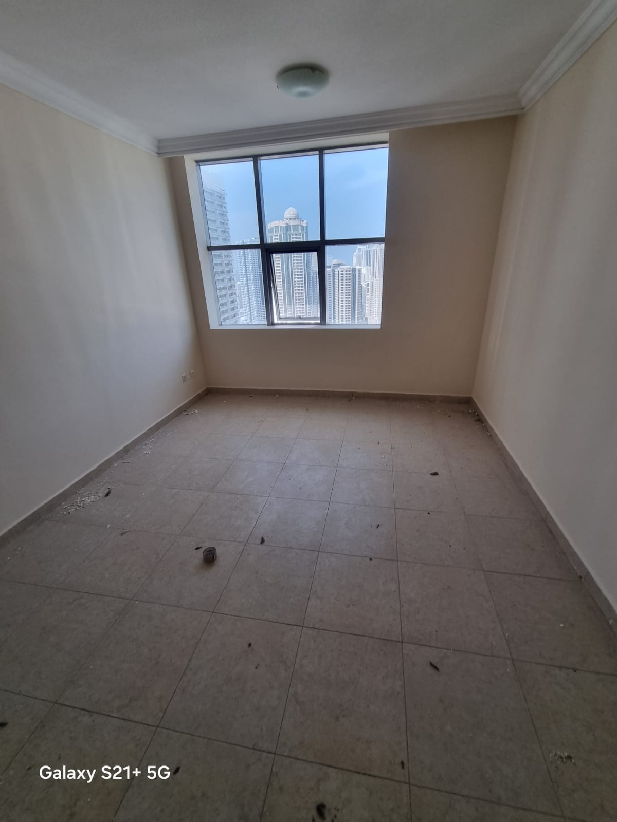 2BR apartment in Al Khan, 3 baths, maid’s room, balcony, central AC & parking, quiet family-friendly area near the beach.