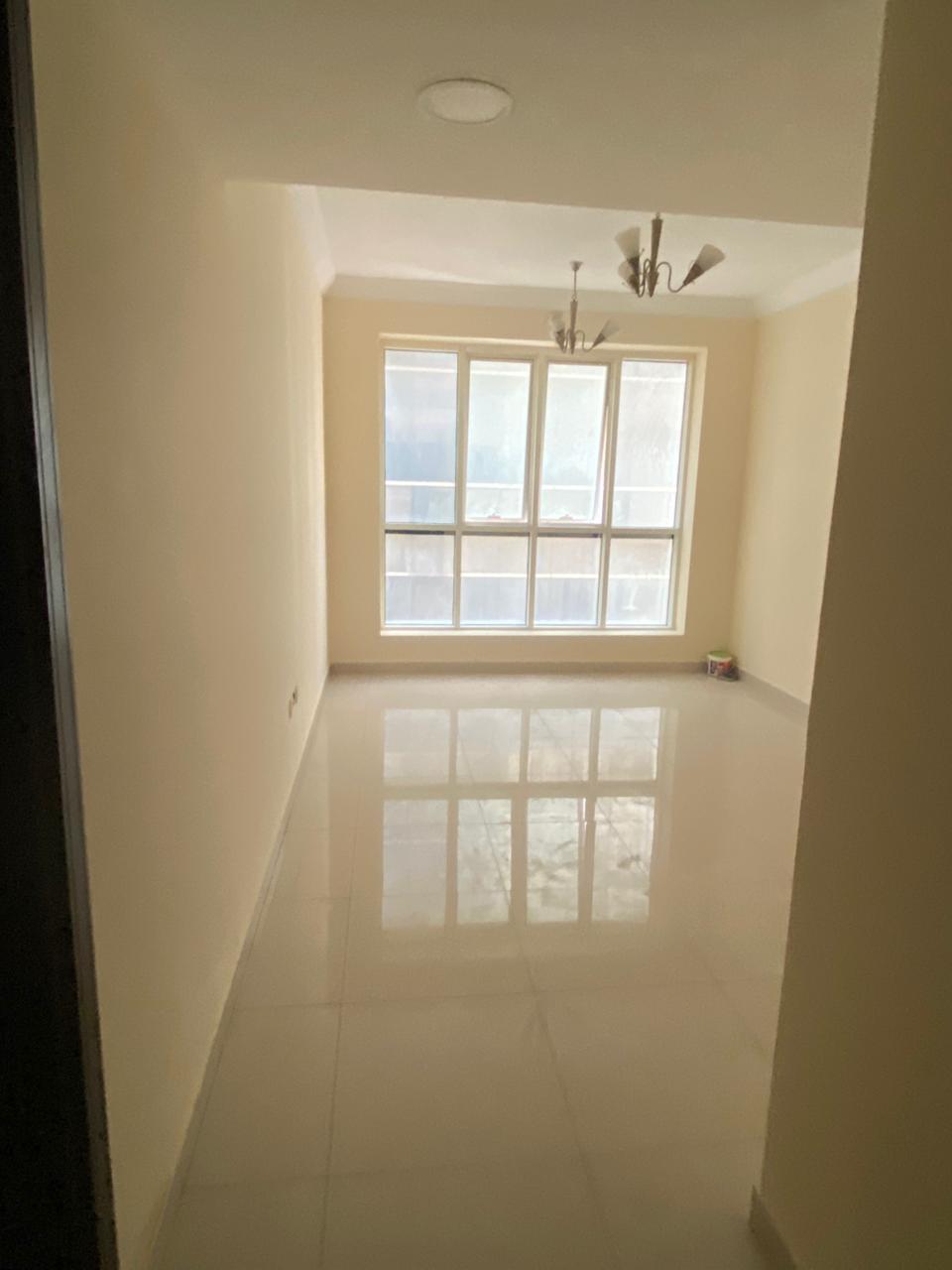 One bedroom, living room, 2 bathrooms in Al Majaz 2 on Al Wahda Street, free parking and payment facilities for 35,000 dirhams.