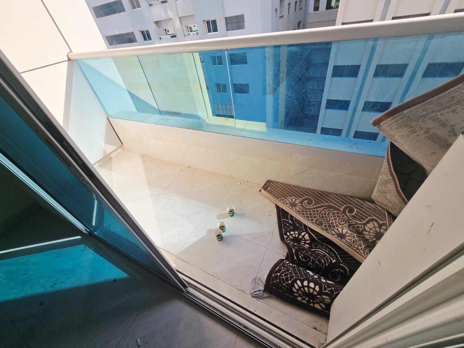 A 3-bedroom apartment with a living room, balcony, and storage in Al Majaz, Sharjah. Free parking and payment facilities for 57,000 dirhams.