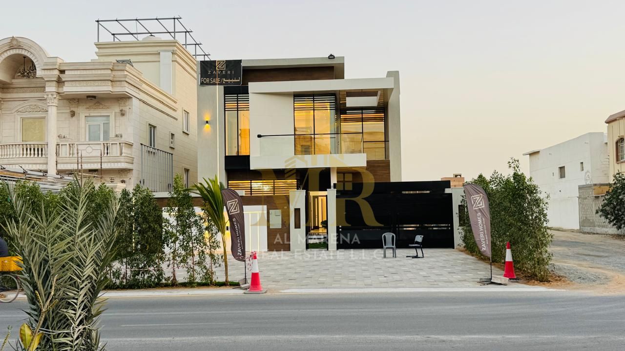 Own a two-story villa with a European design and high-end finishes, including water, electricity, and air conditioning. Ready to move in, in one of Aj