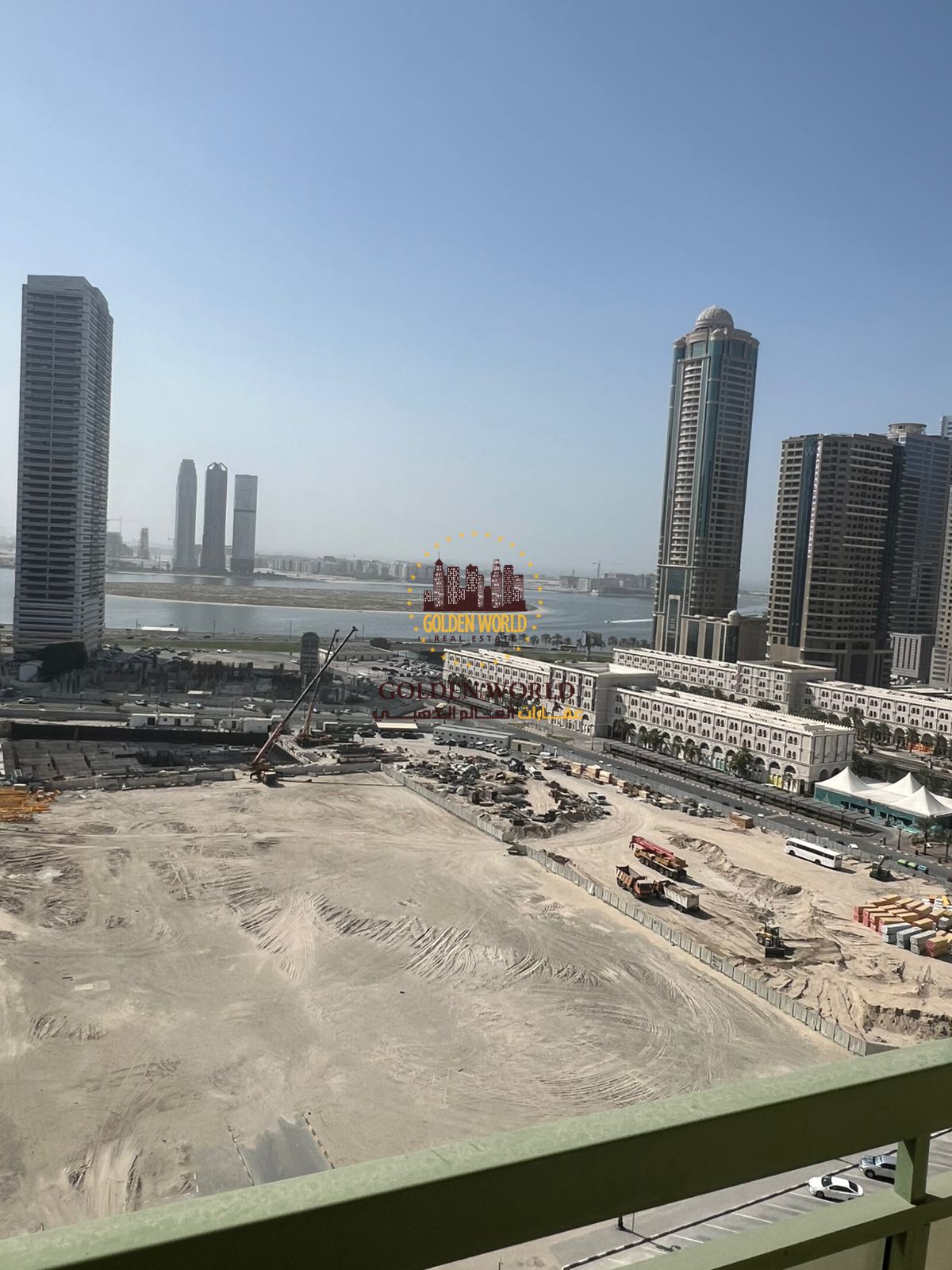 Two-bedroom apartment with living area and two balconies in Al Majaz 3, featuring two bathrooms, free AC, and spacious layout.