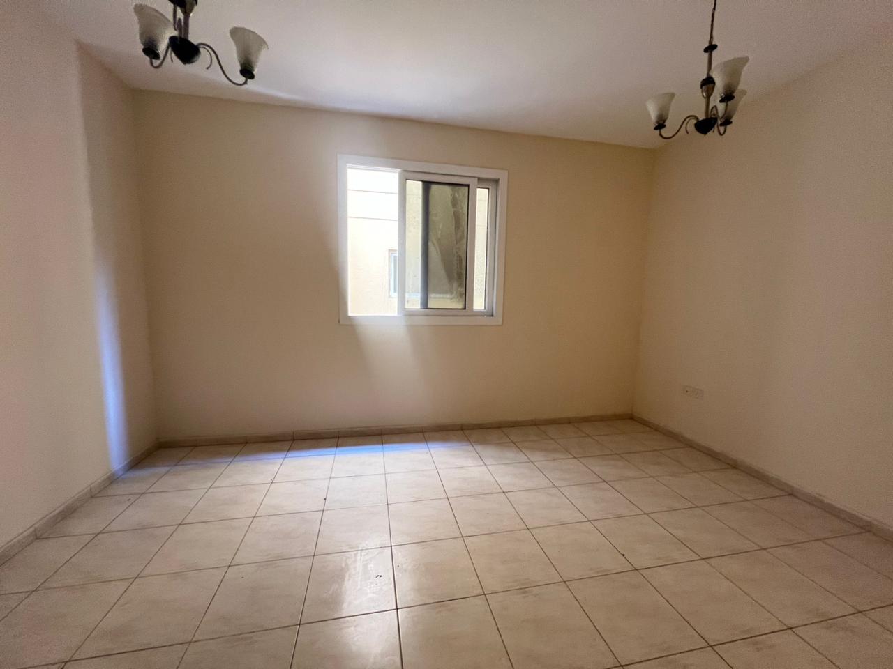 Two-bedroom apartment with living room in **Al Majarra**, prime location close to all services, with flexible payment options, ideal for families.