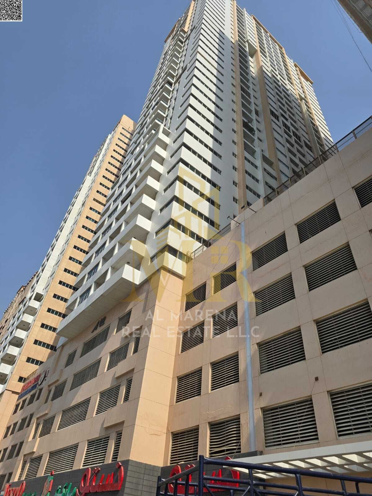 Two-bedroom apartment for sale in Ajman One, in a prime location near the Corniche within a fully serviced community. Comfortable spaces and modern fi