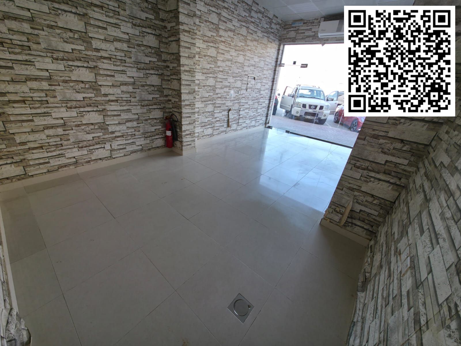 Commercial space for annual rent near Sheikh Ammar Street, Al Rawda, Ajman. Price: AED 23,000 payable in installments. Large area, new building on a m