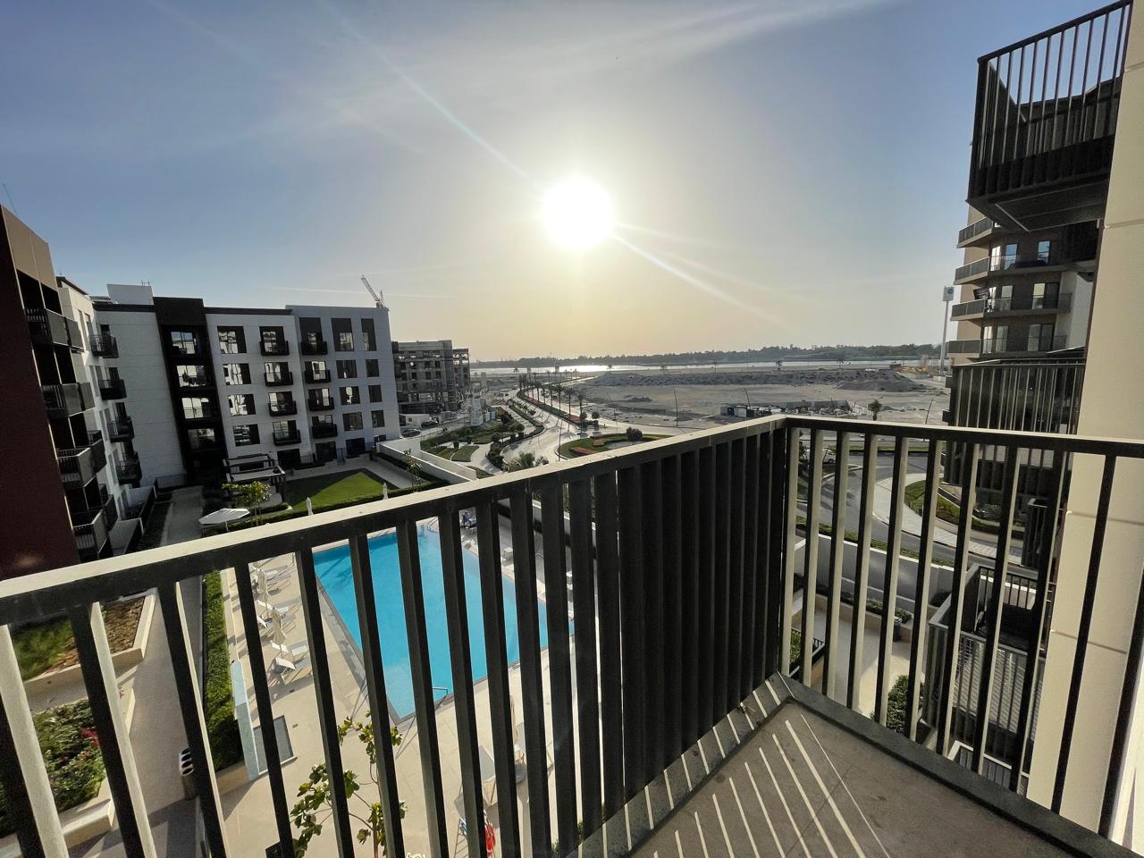Sea view with balcony, free parking, gym & pool. Prime, lively location near cafes, shops, and close to the Dubai exit.