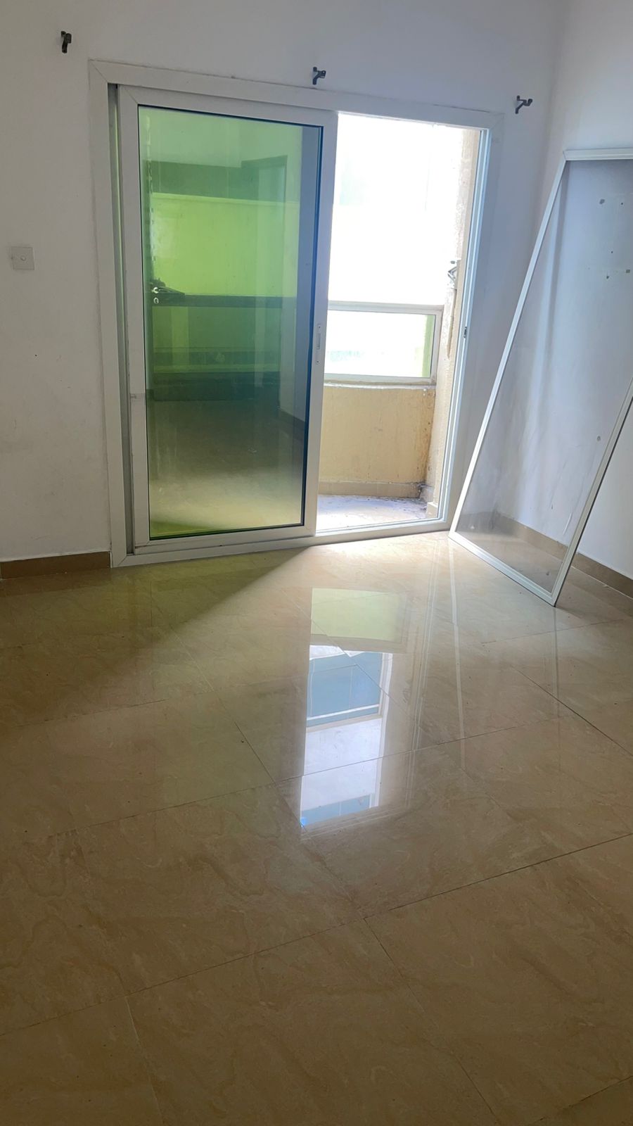 Cheapest one-bedroom apartment in Al Majaz 1, second row from the Corniche, excellent size, payment facilities, no deposit or fees