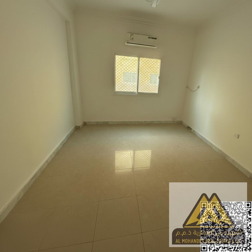 1-Bedroom Apartment with Living Room for Annual Rent – Al Rawdha 2, Ajman (Ground Floor, 2 Bathrooms, Split AC)