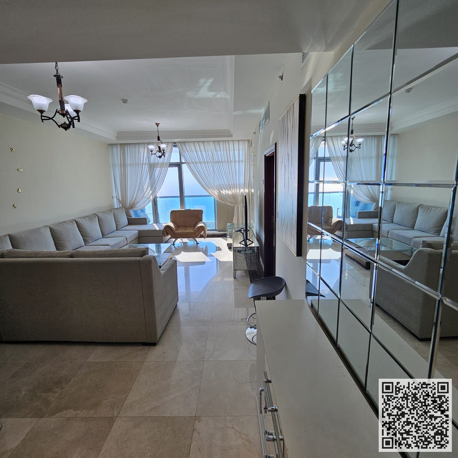 Sea view three-bedroom duplex apartment for monthly rent in Corniche Residence Towers, Ajman Gym, pool, and parking Largest spaces in Ajman